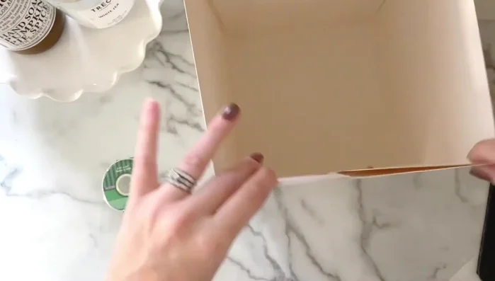 Secure the base: Use invisible tape to secure the edges and seams for added strength and a clean finish. Apply tape to the sides first, ensuring the seams are snug.