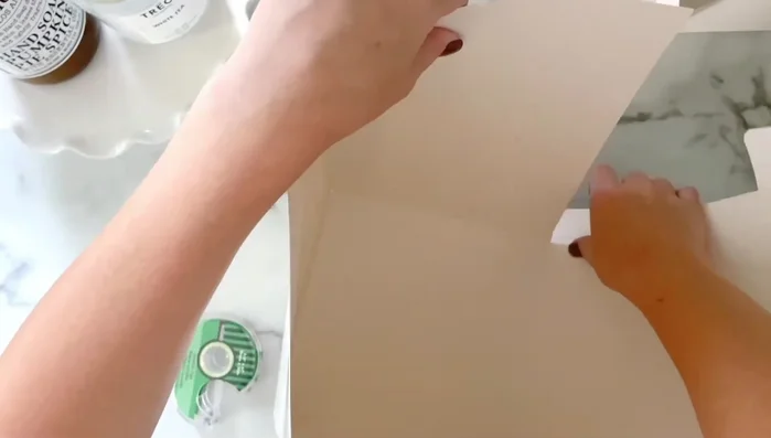 Optional: Add extra tape to the middle section of the box for increased stability.