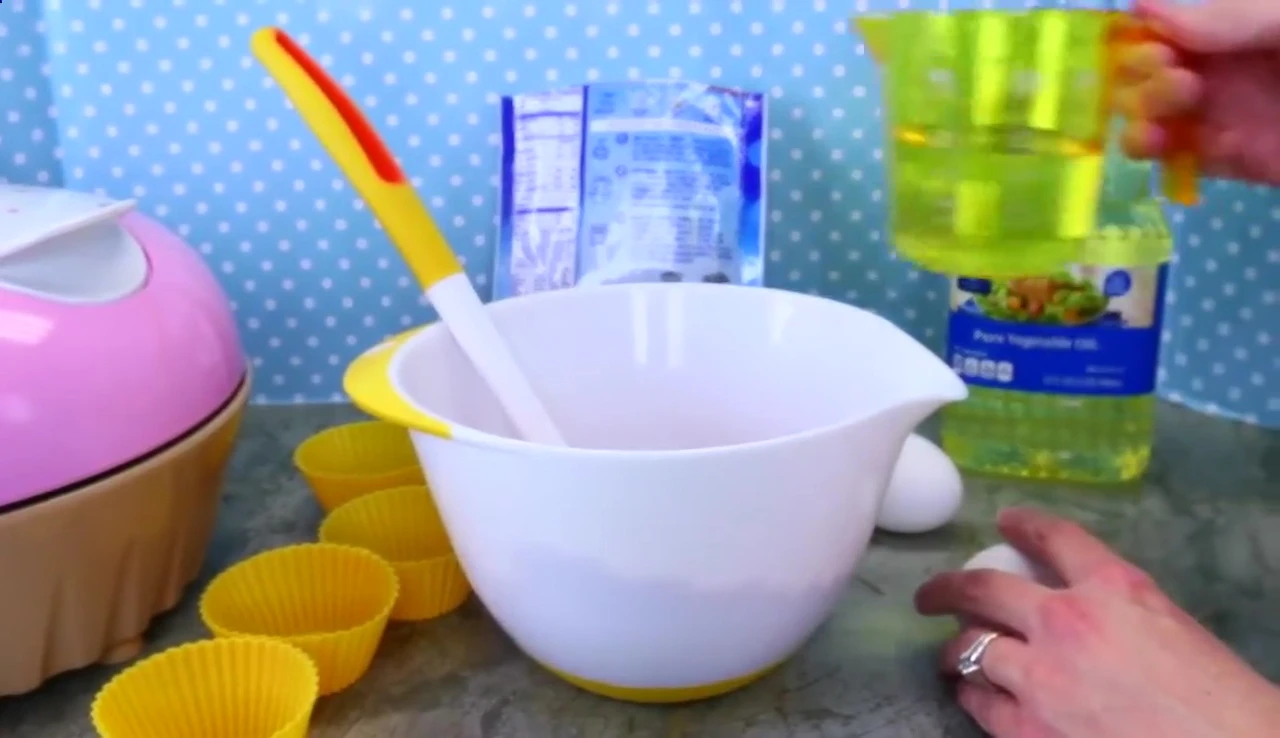 Measuring cups being used to measure ingredients.