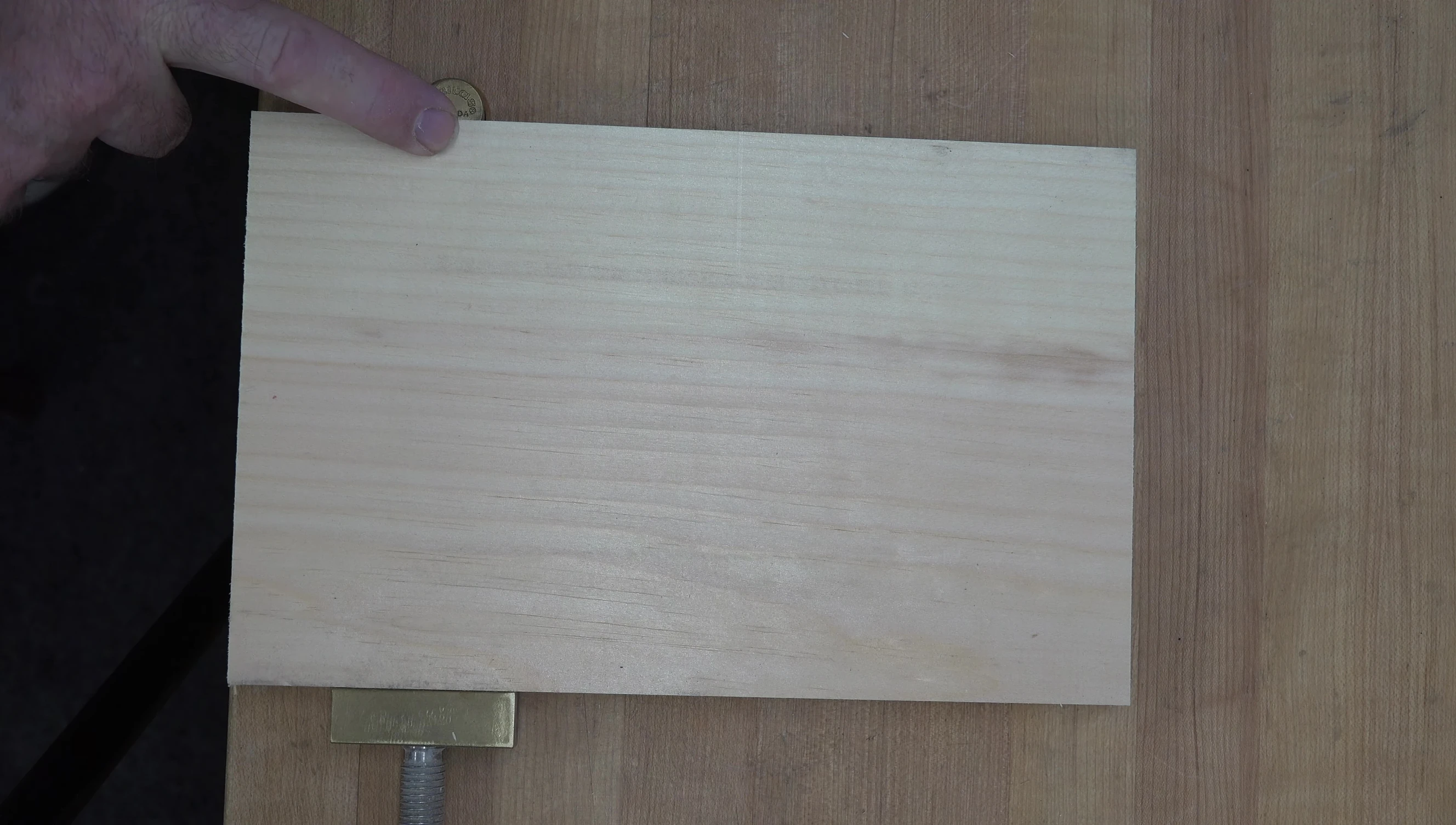 The squared-off piece of pine wood