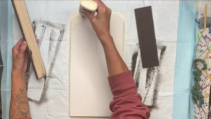 Assemble the wood structure: Glue and clamp the painted wood pieces together, ensuring a strong bond with Elmer's wood glue.