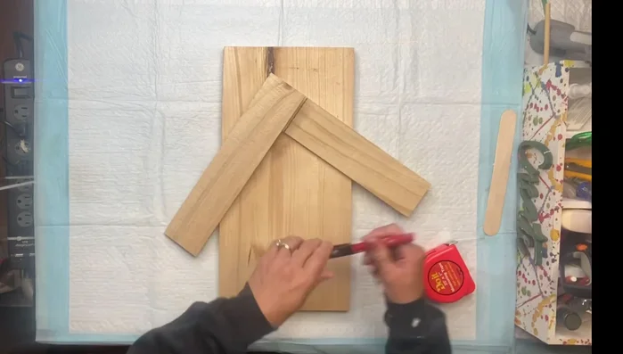 Mark and cut the smaller pieces to create the top peak.