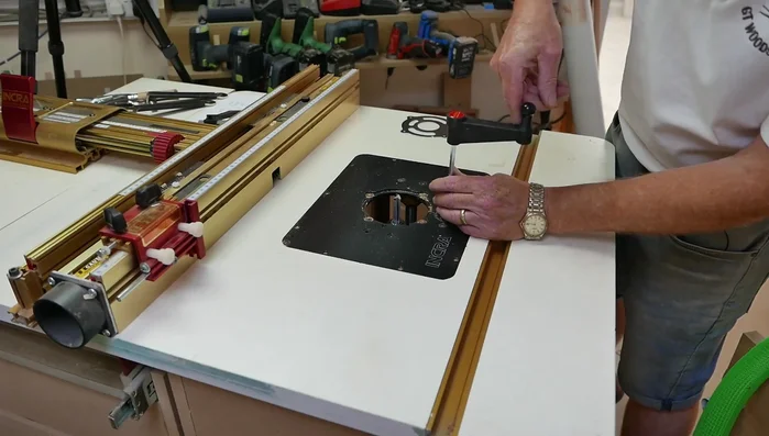 Cut the lip slots: Change to the slot cutter bit. Adjust the height precisely to avoid leaving a shoulder. Perform climb cuts, ensuring a secure grip on the workpiece to prevent kickback. Reduce router speed for wider cuts.