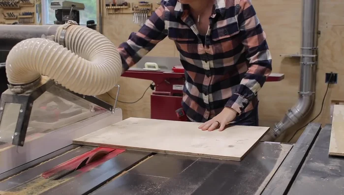 Assemble the mechanism, attaching the pipes, circles, and a paint stir stick (food agitator) using glue and bolts.