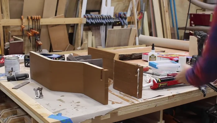 Attach a lid using a piano hinge and screws.