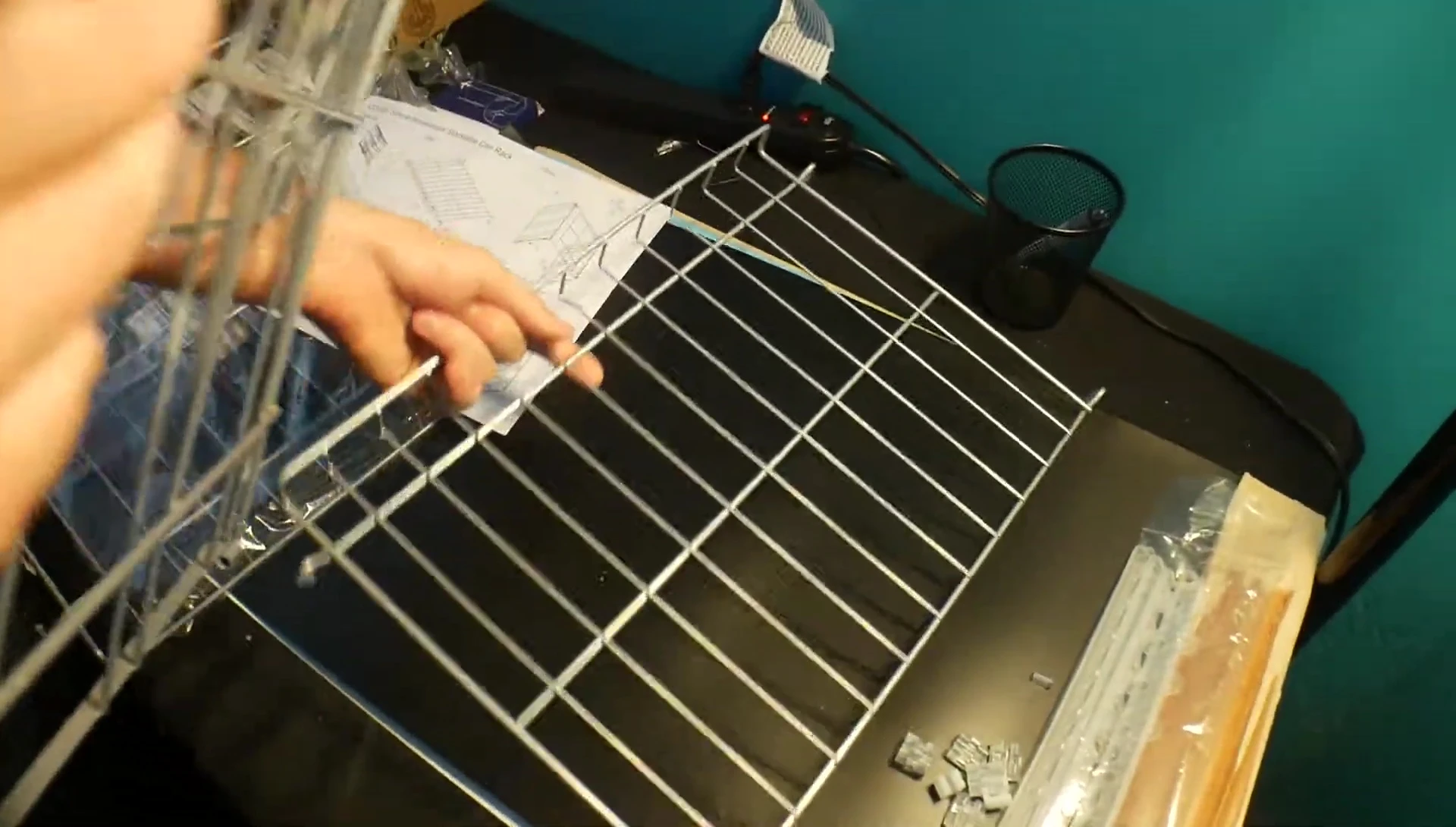 The reviewer is positioning the tray for assembly.
