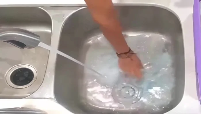 Submerge the silicone in the hot soapy water and allow it to soak for an hour.