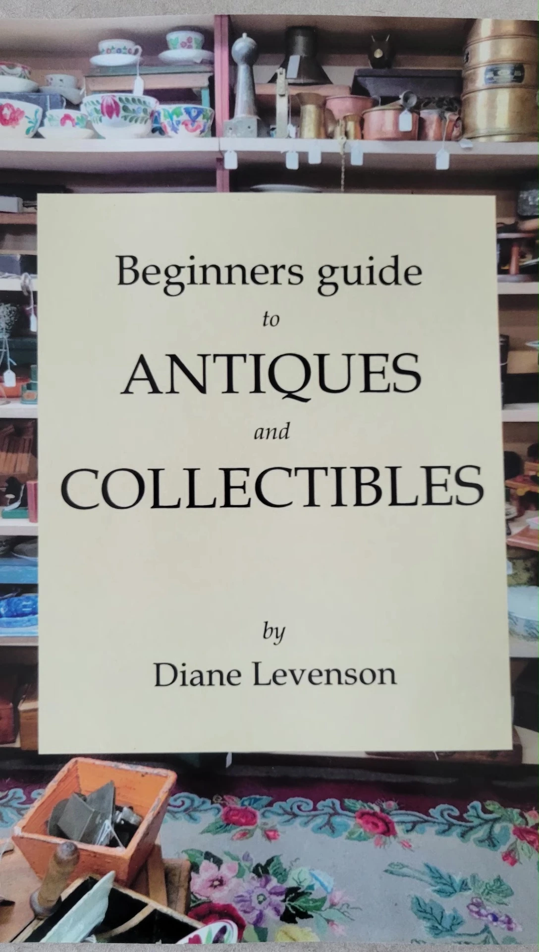 A book cover for a guide to antiques and collectibles
