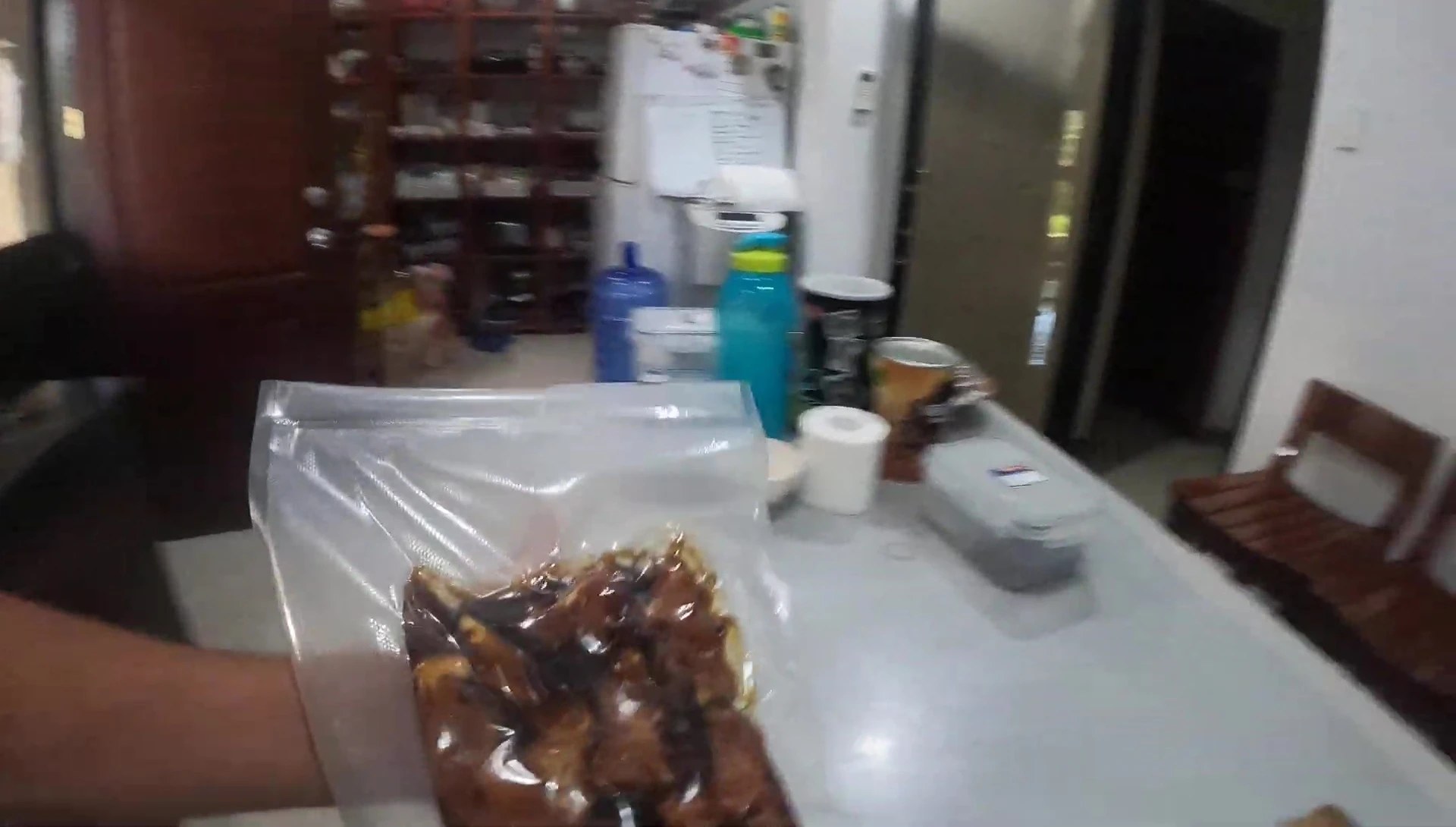 The liquids are seen draining from the bottom of the bag while the top remains dry.