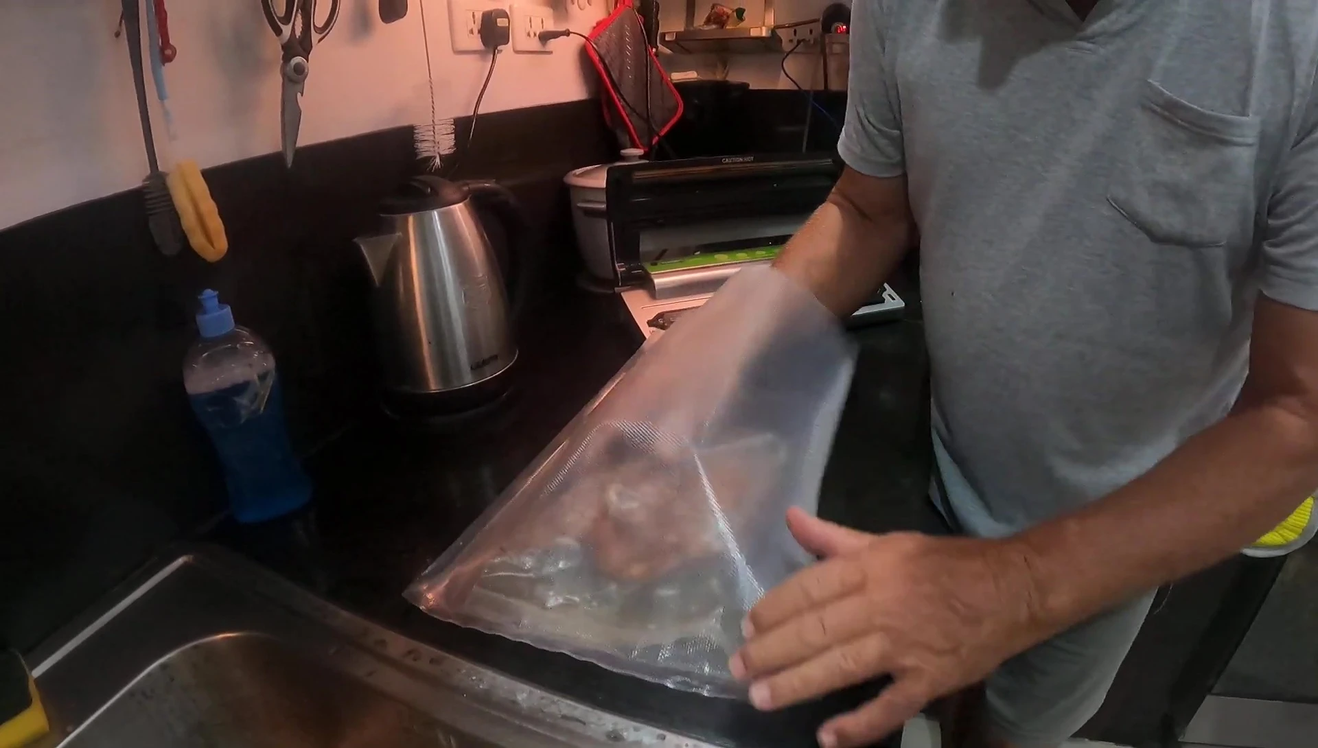 The vacuum sealer bag successfully sealed with all liquid drained.