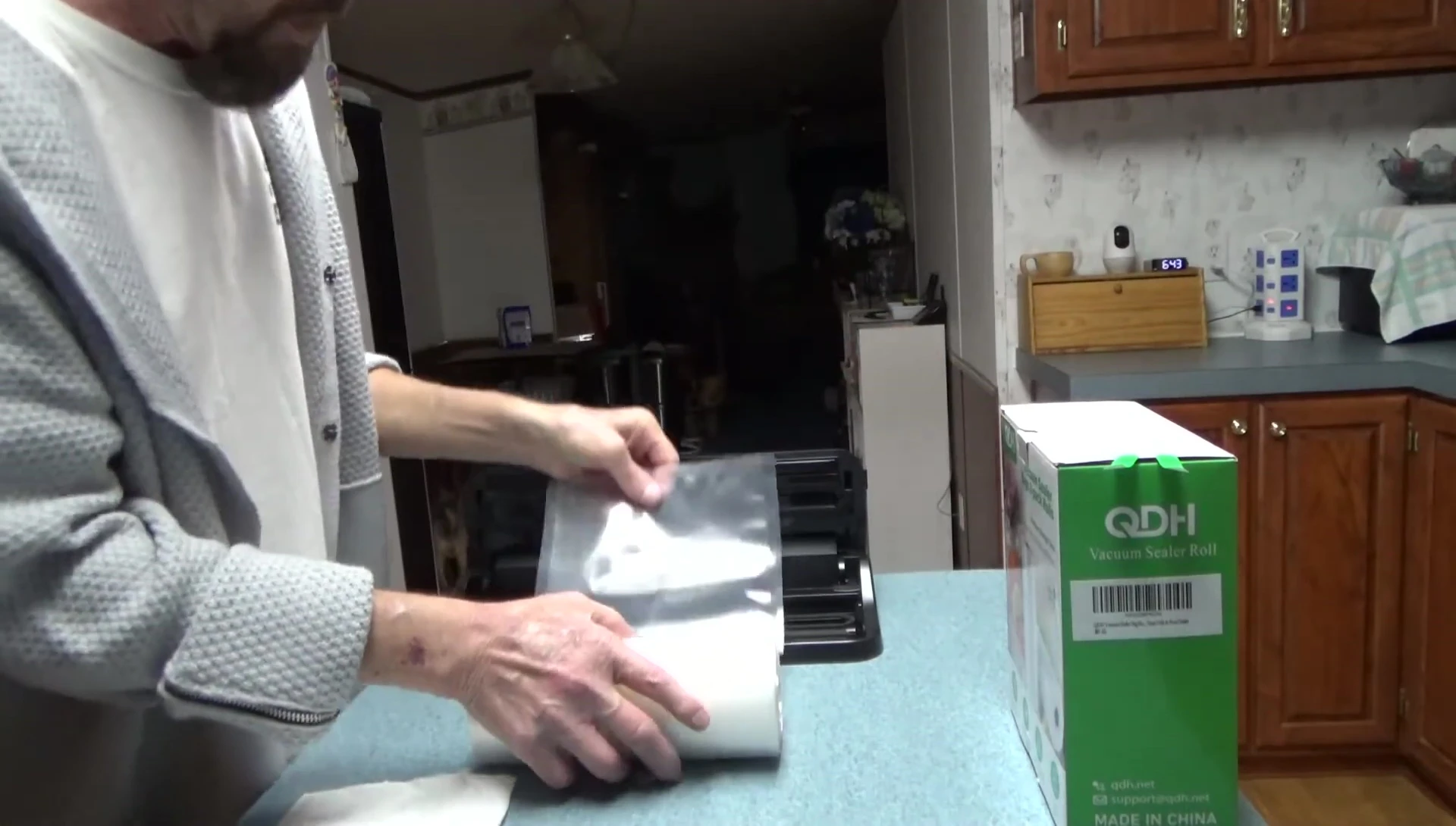 Cutting the bag to the desired size.