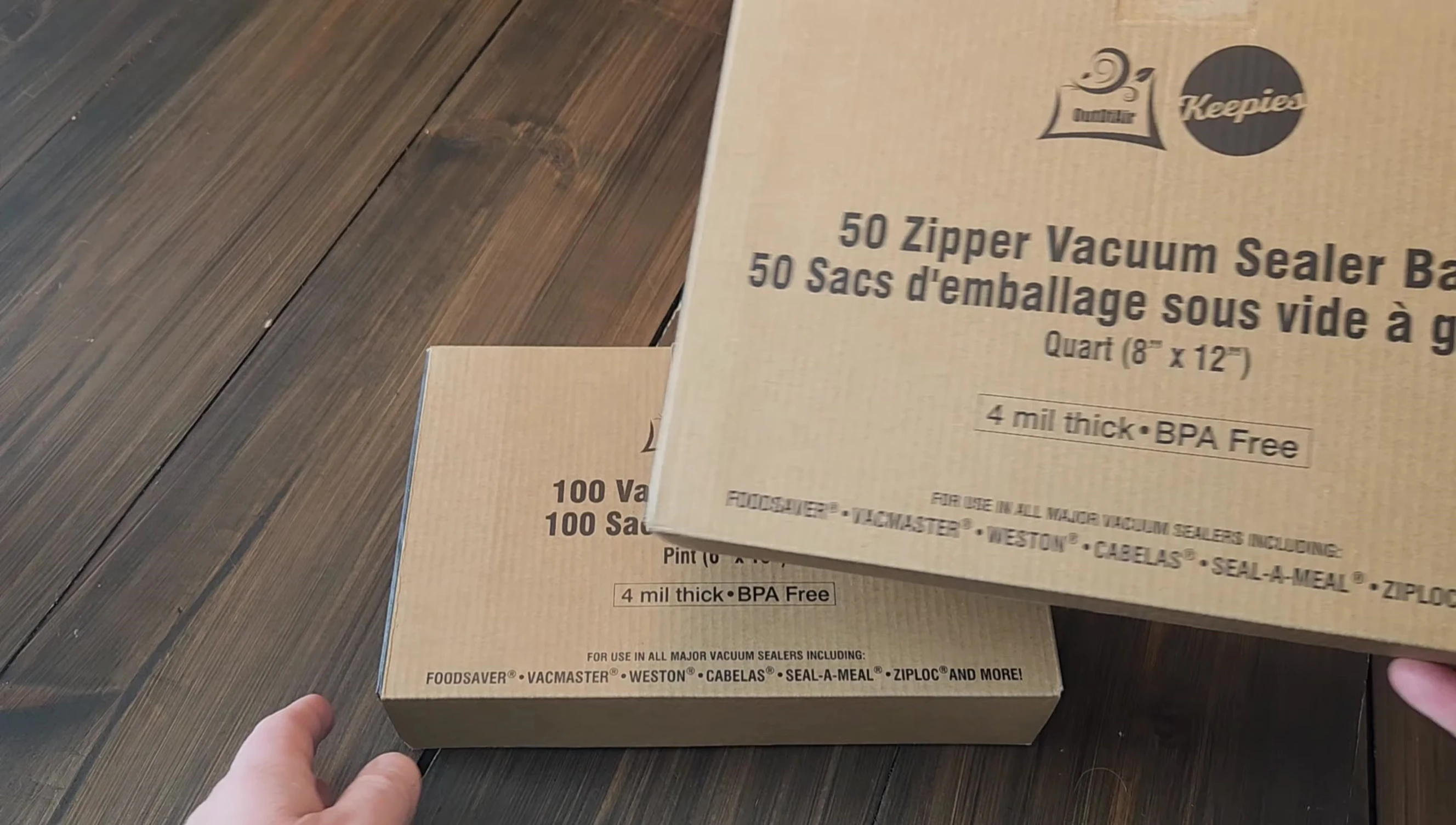Variety of OutOfAir vacuum sealer bags shown.