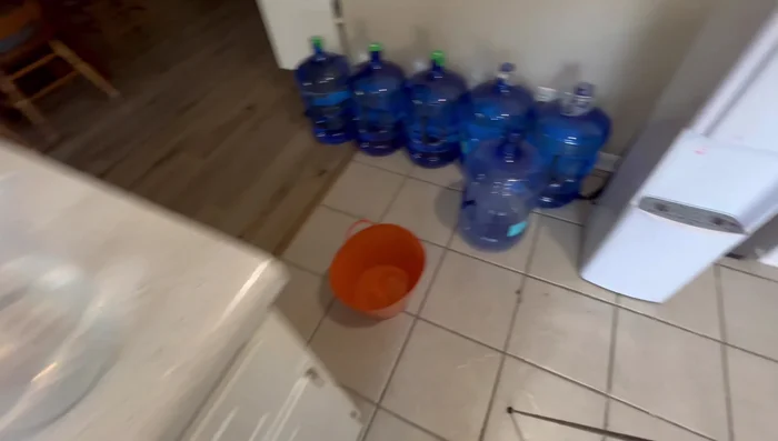 Remove any remaining water from the reservoirs by dispensing from the hot and cold taps into a pitcher or bucket.