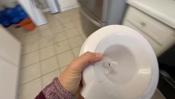 Remove the bottom drain cap and allow any remaining cleaning solution to drain completely. Clean the removable parts with soap and water or a Mr. Clean Magic Eraser.