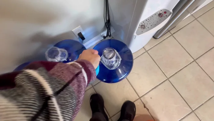 Reassemble the dispenser, install a fresh water bottle, and turn it on.