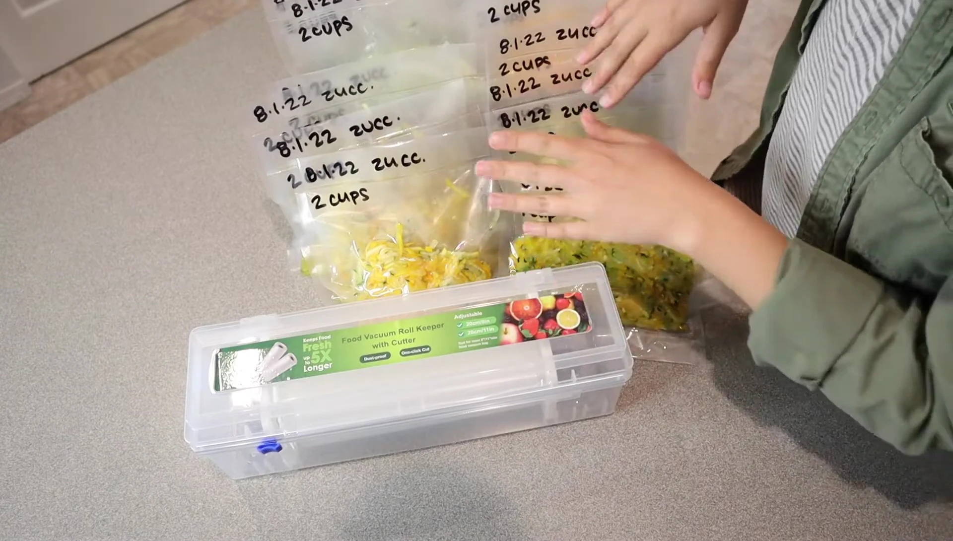 Multiple vacuum-sealed bags of zucchini.