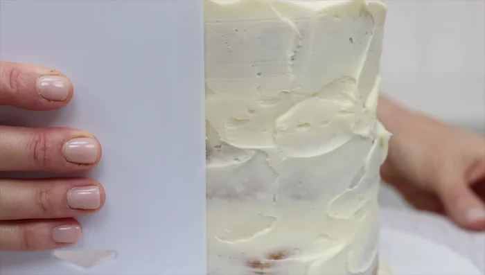 Apply the final layer of frosting after the cake has thawed slightly. This allows for smoother and more precise frosting.