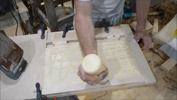 Assemble the tambour using a clamping jig (link provided in the video).