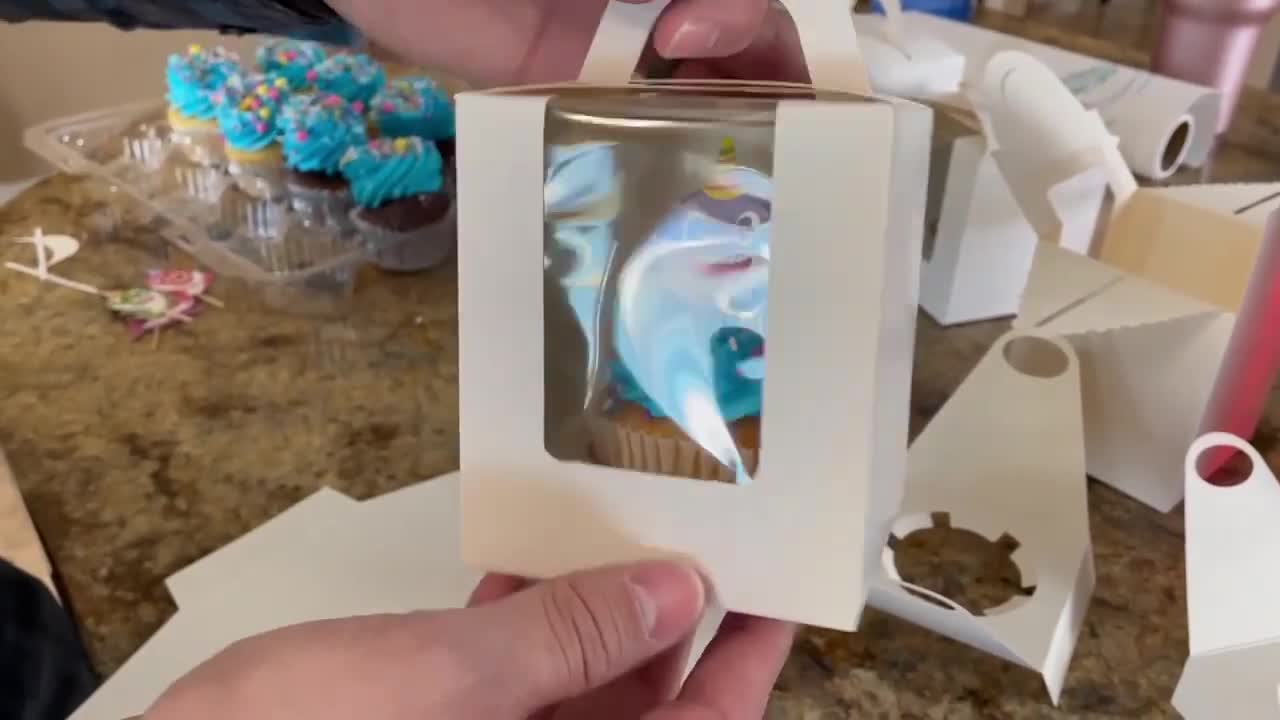 Close-up of assembled cupcake box with a cupcake inside