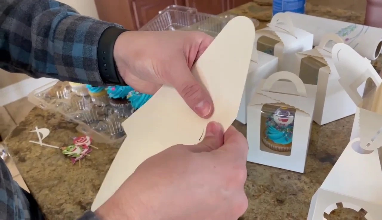 Folding the shorter sides downwards