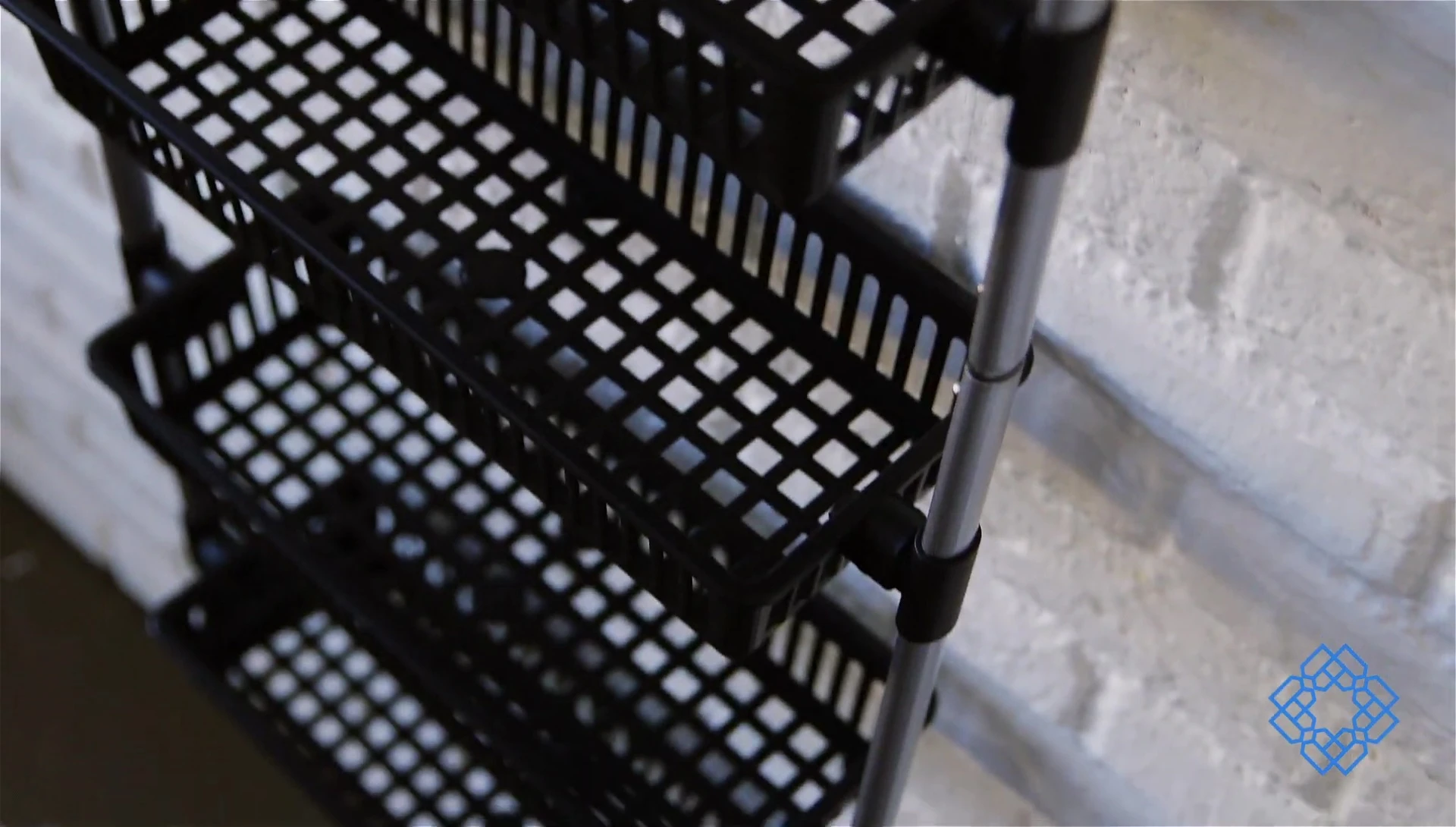 Close-up showing the steel frame and plastic baskets