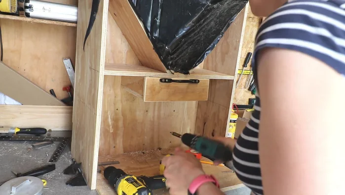 Add a pulley handle for easy operation, ensuring proper spacing to prevent rubbing.