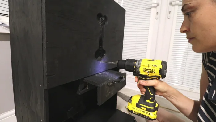 Drill a small hole for a poking device (e.g., a knitting needle) to help release stuck biscuits.