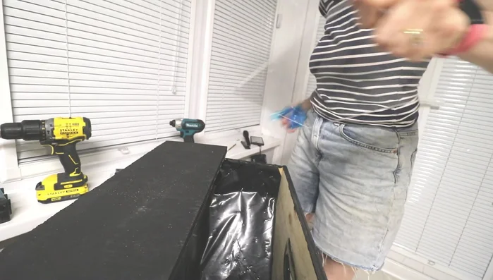 Install perspex compartments for dog treats. Drill holes on either side for easy access.