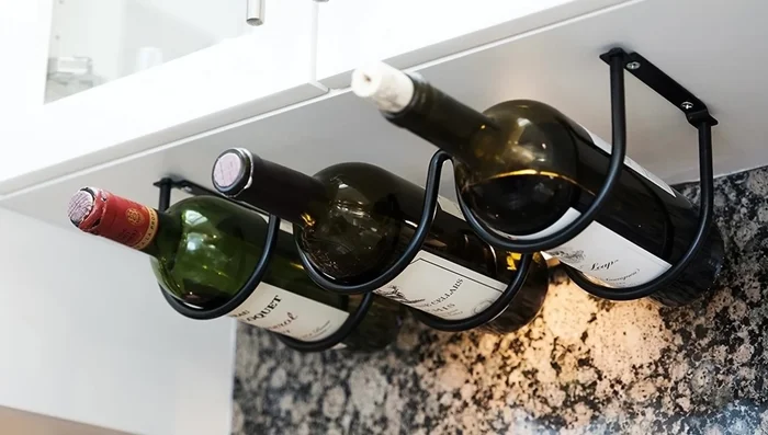 Use an over-the-door shoe organizer to store various items in the kitchen.