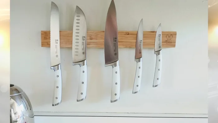 Use a magnetic knife strip to store knives on the wall.