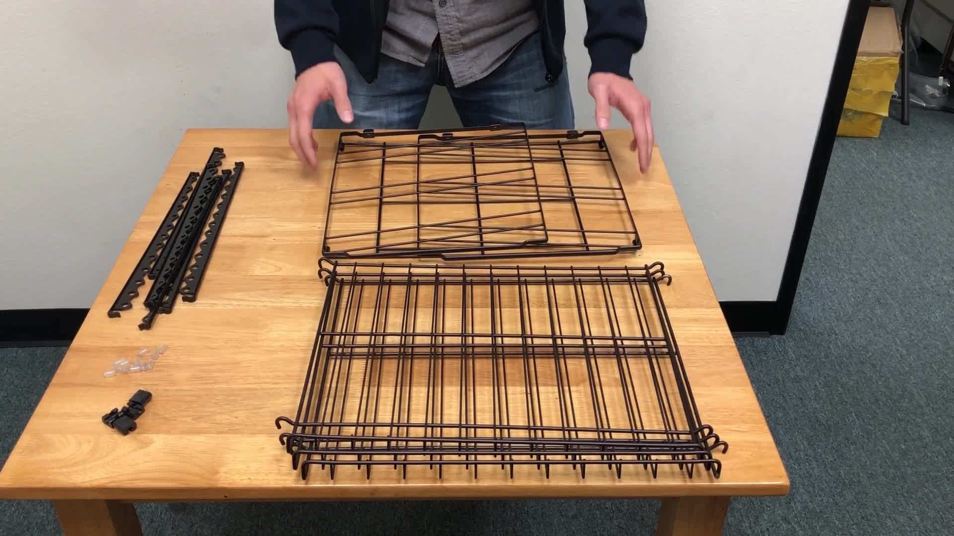 Close-up view of the various components of the can rack, including the base (Part A), racks, dividers, rubber feet, and end caps.
