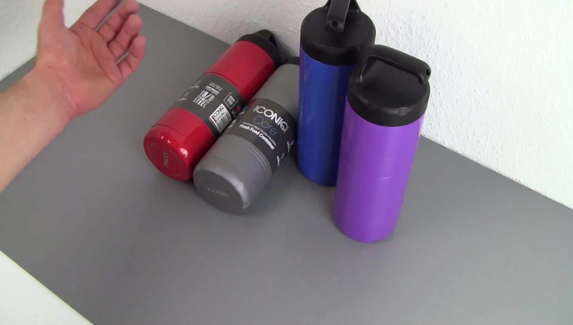 The ICONIQ Qore food thermos in its minimal packaging.