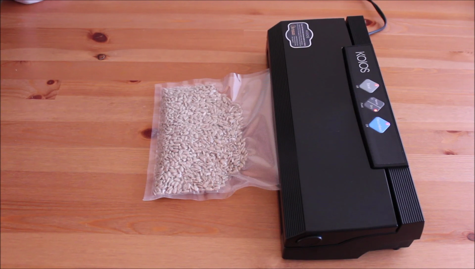 The vacuum sealer working with a bag of nuts