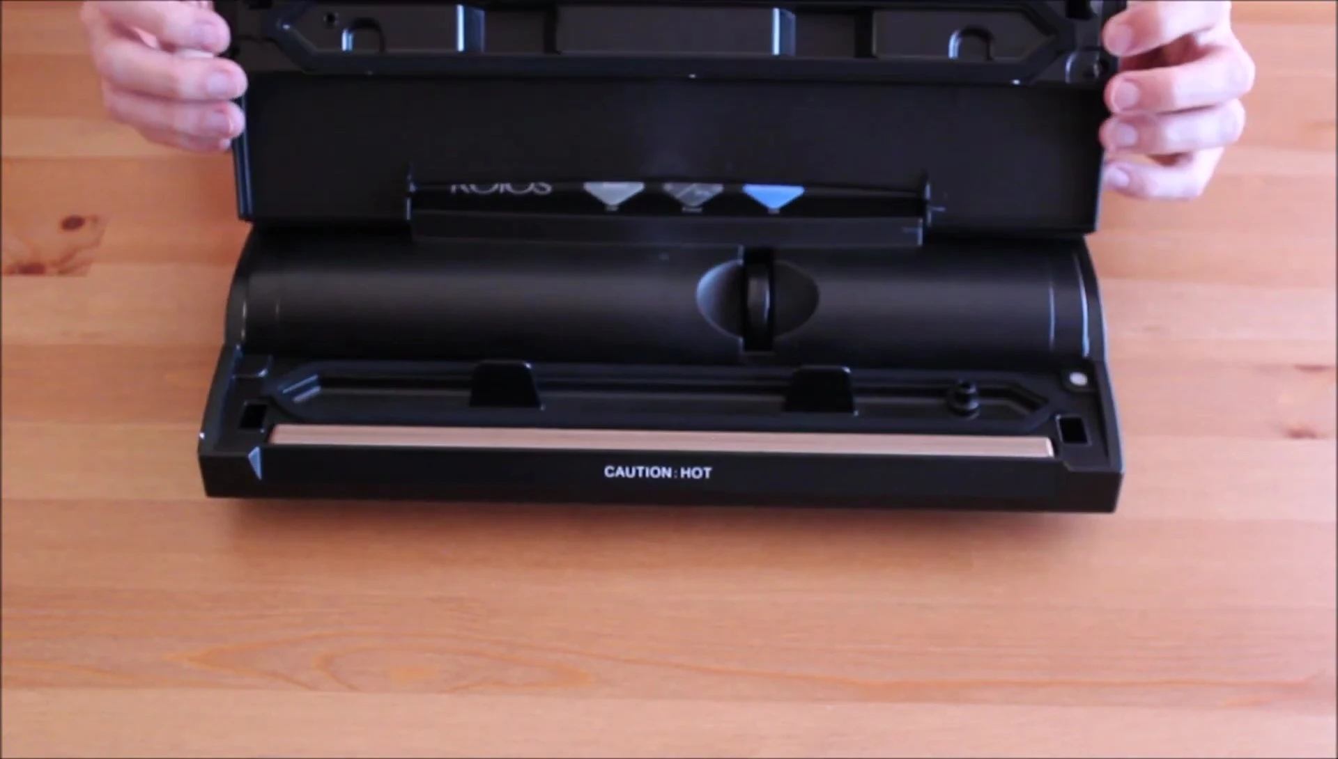 Close-up of the vacuum sealer's built-in cutter