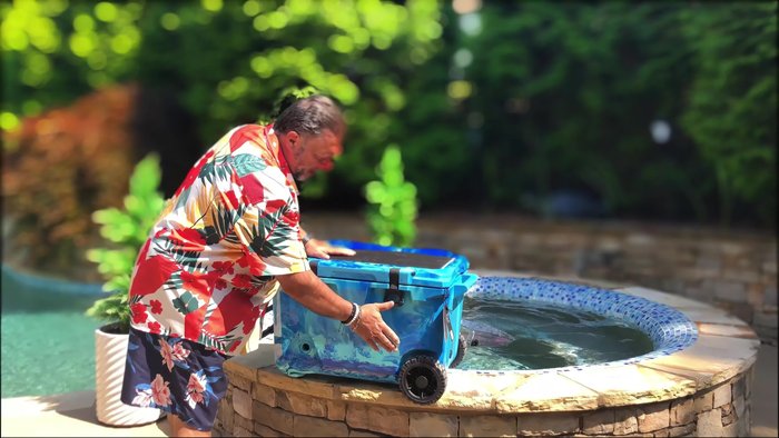 Brew Tank Usage: The removable tank slides into a holder within the cooler. An included adapter (with a cover) allows for easy ice filling. A tray keeps items dry.