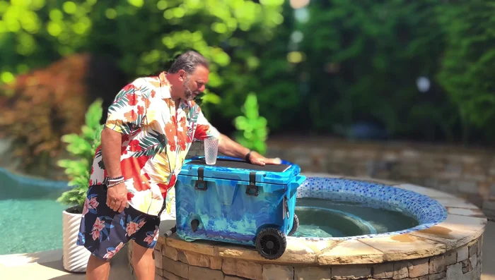 Dispensing Drinks: The soft, non-slip top allows for easy access. Open the valve, remove the cover, place your cup, and dispense.