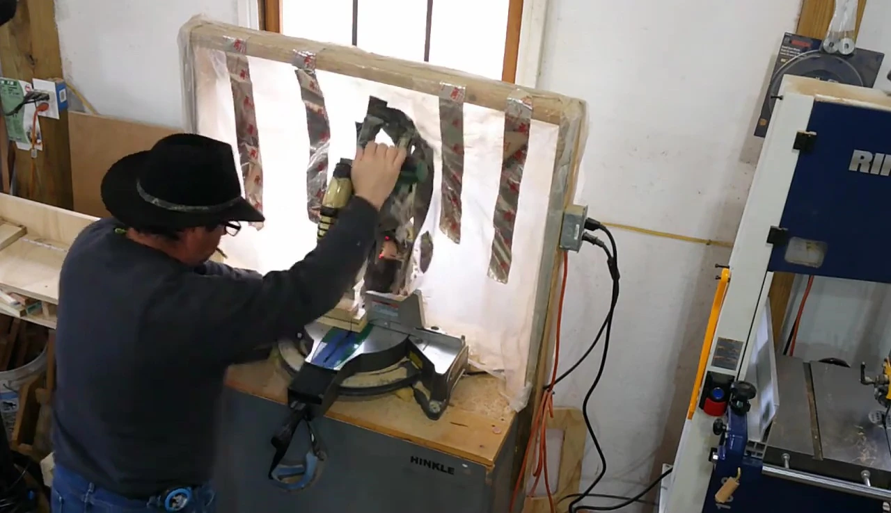 Time-lapse or close-up shot of the maker assembling the parts of the K-Cup holder.