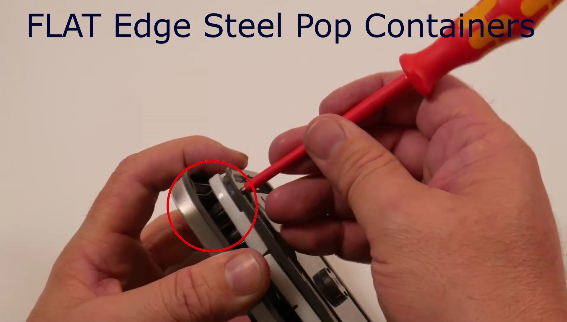 Showing the tabs that need to be pried open.