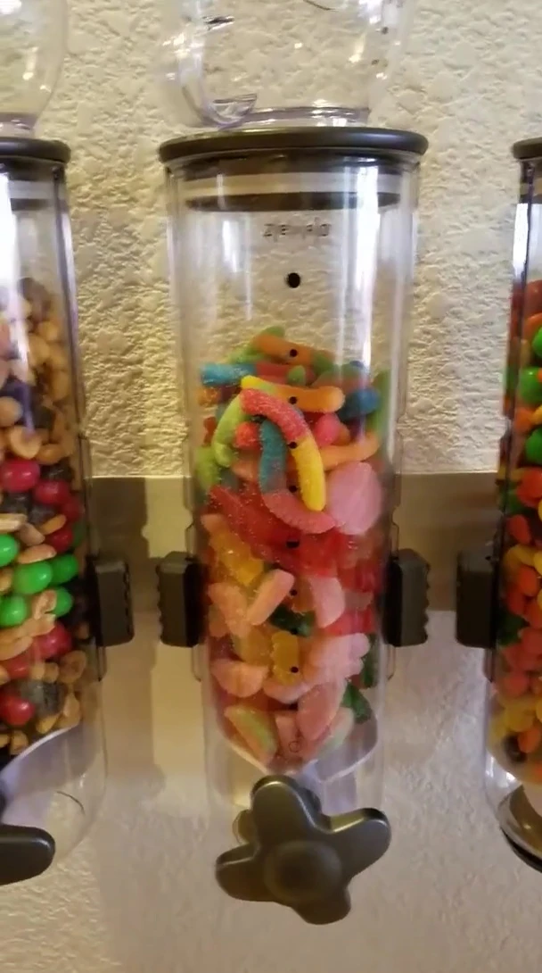Close up shot of containers inside the dispenser slots