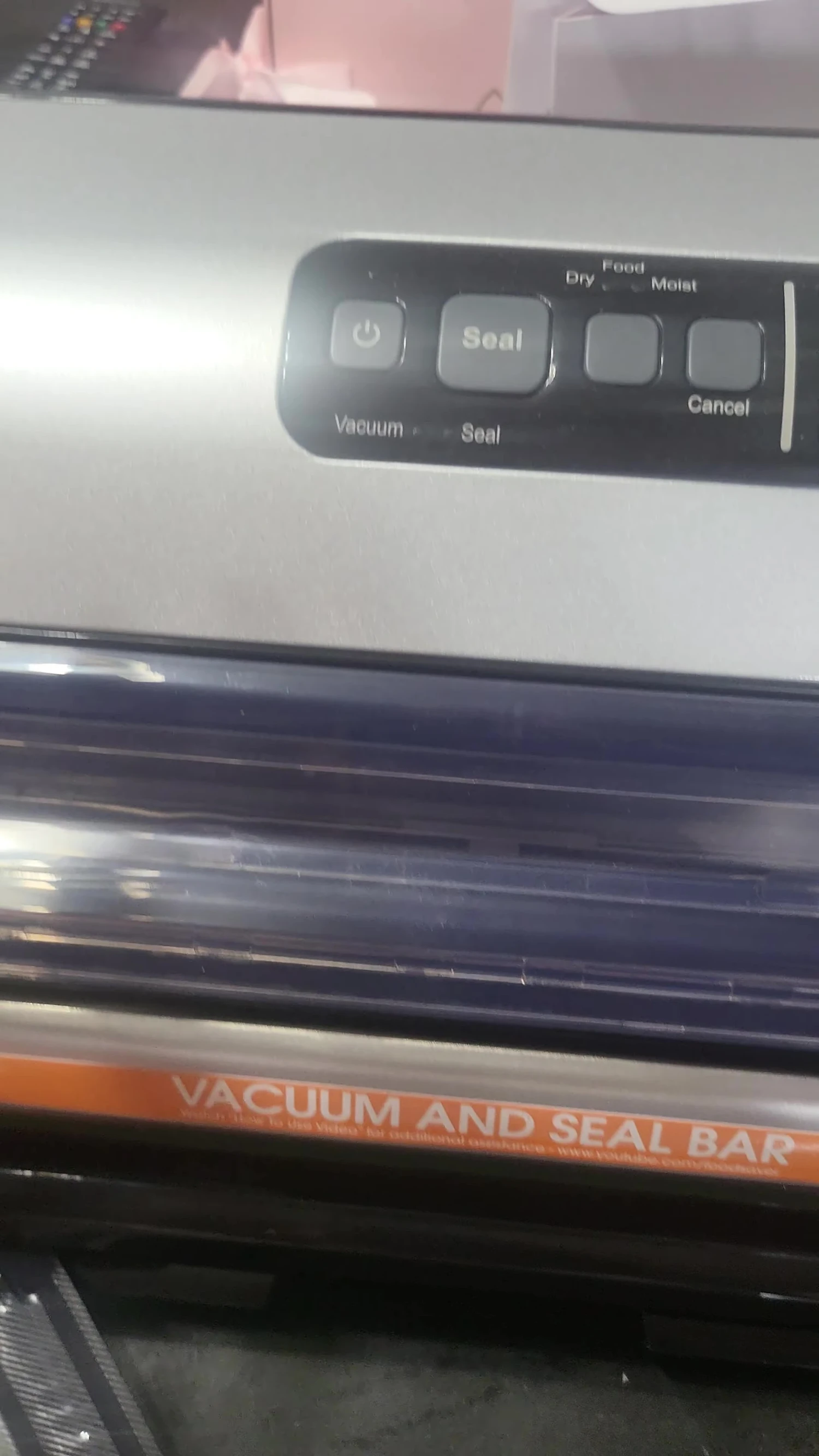 The FoodSaver machine turned on and ready for use.