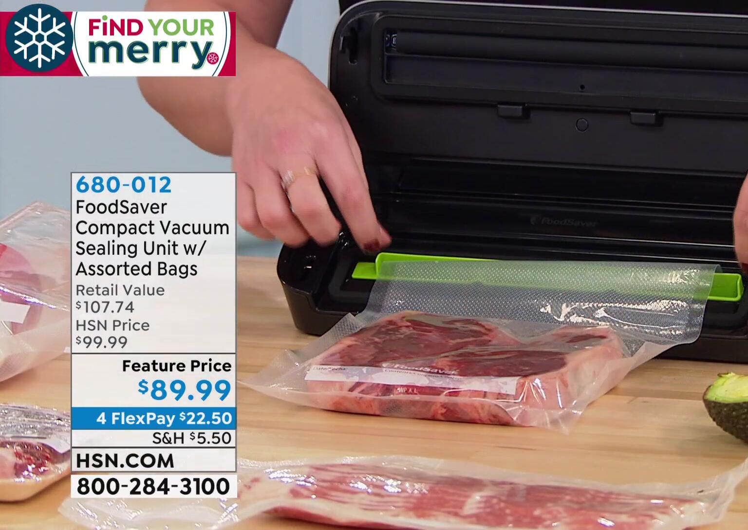 Interior view of the FoodSaver Compact showing the drip tray and alignment guide.