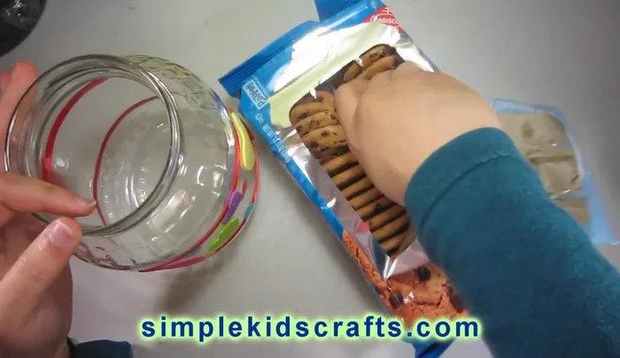 Fill the jar: Fill the decorated jar with cookies or candies.