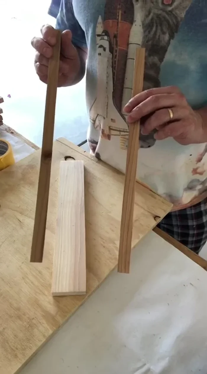 Cut and sand twelve 0.5-inch strips by 1 foot 3 inches for the frame.