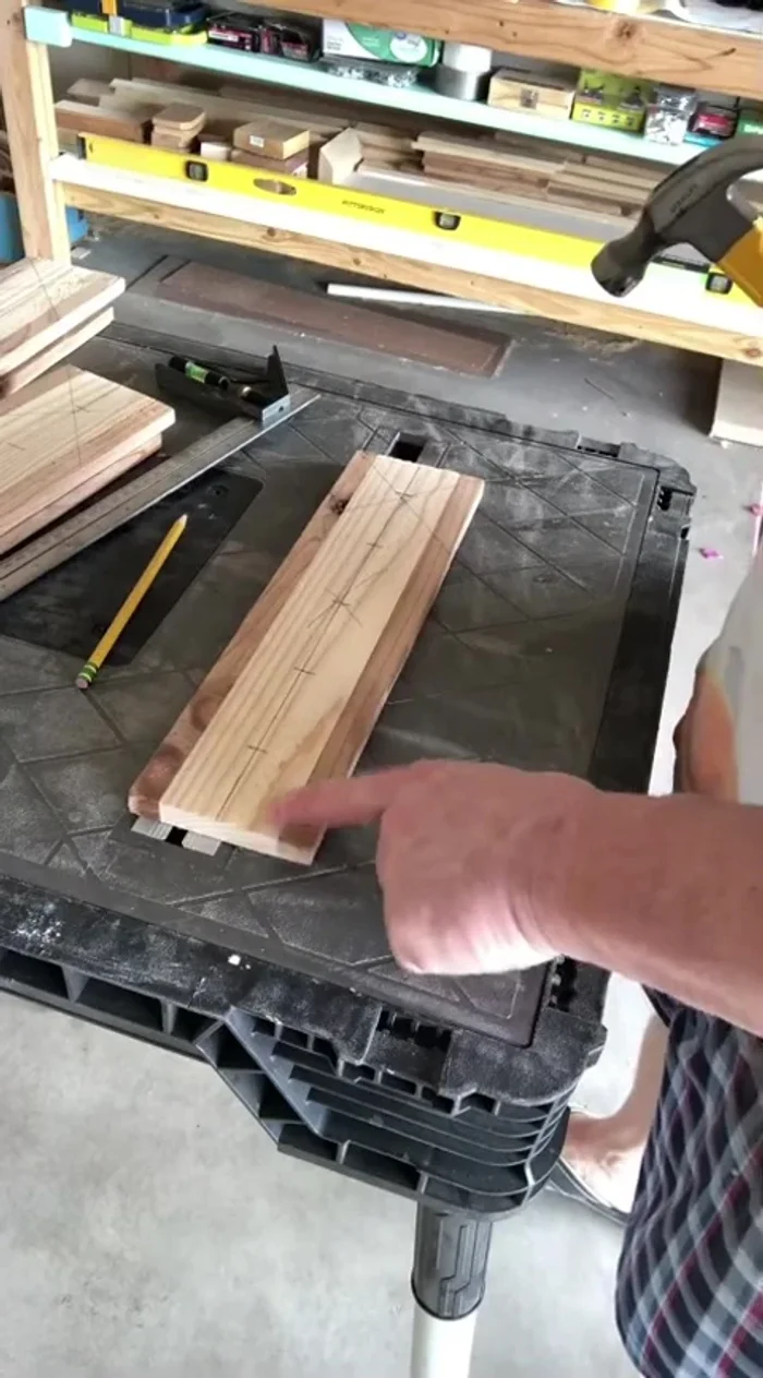 Sand the holes using a hole saw bit with sandpaper taped to it.