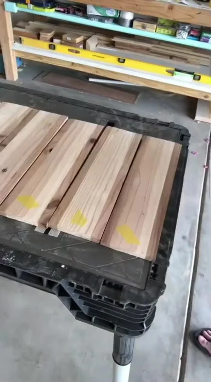 Sand the holes using a hole saw bit with sandpaper taped to it.