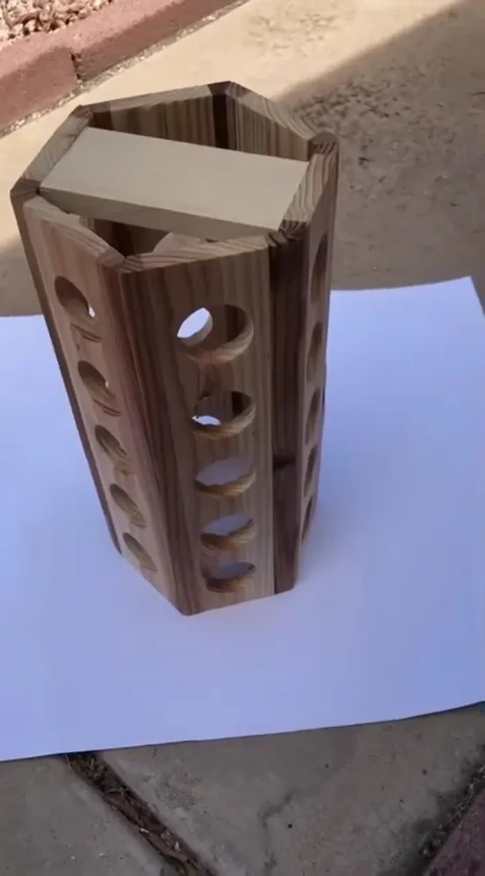 Glue the base and top to the hexagon, using scrap wood to manage glue squeeze-out.