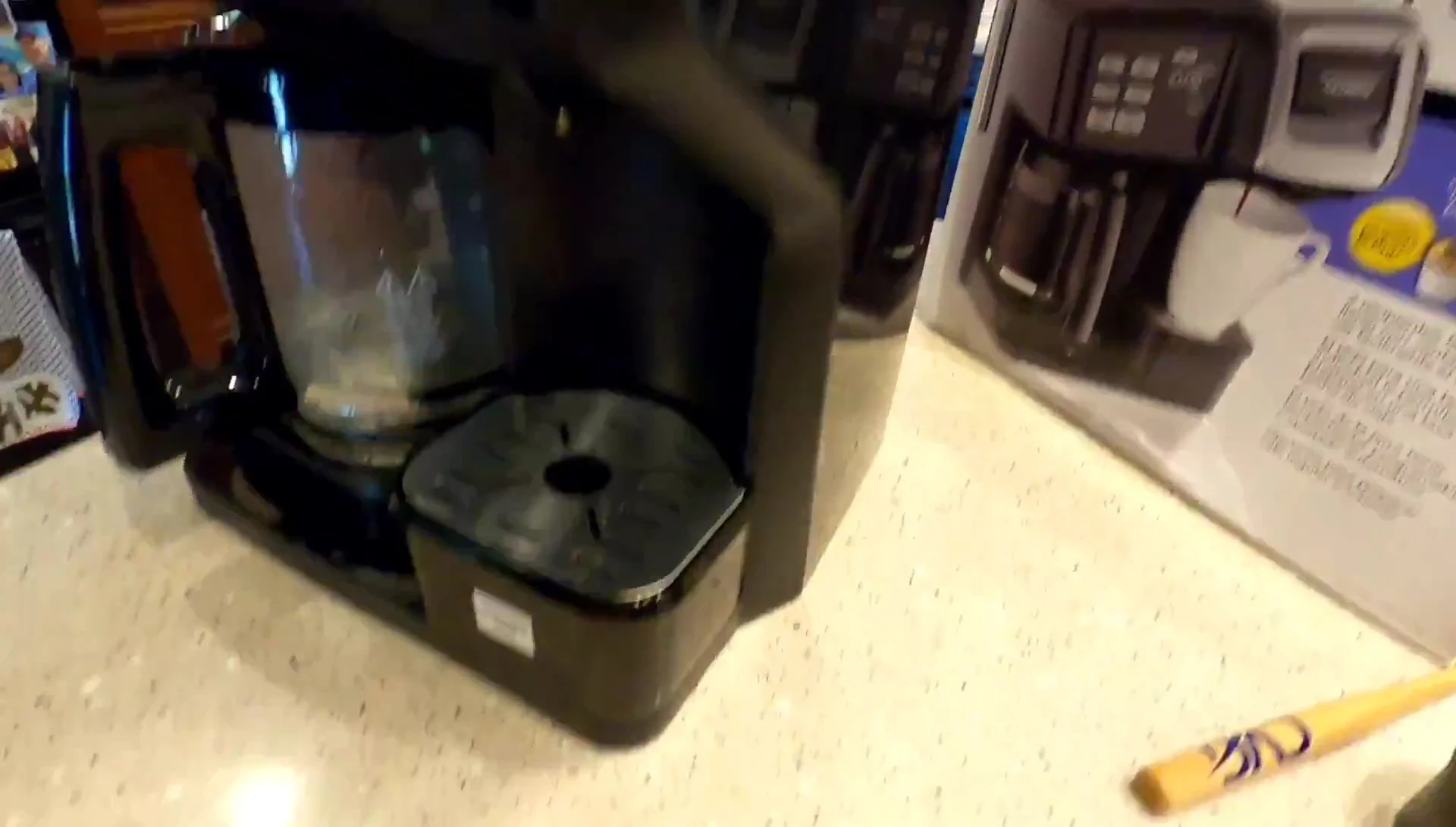Using the single-serve basket for ground coffee.