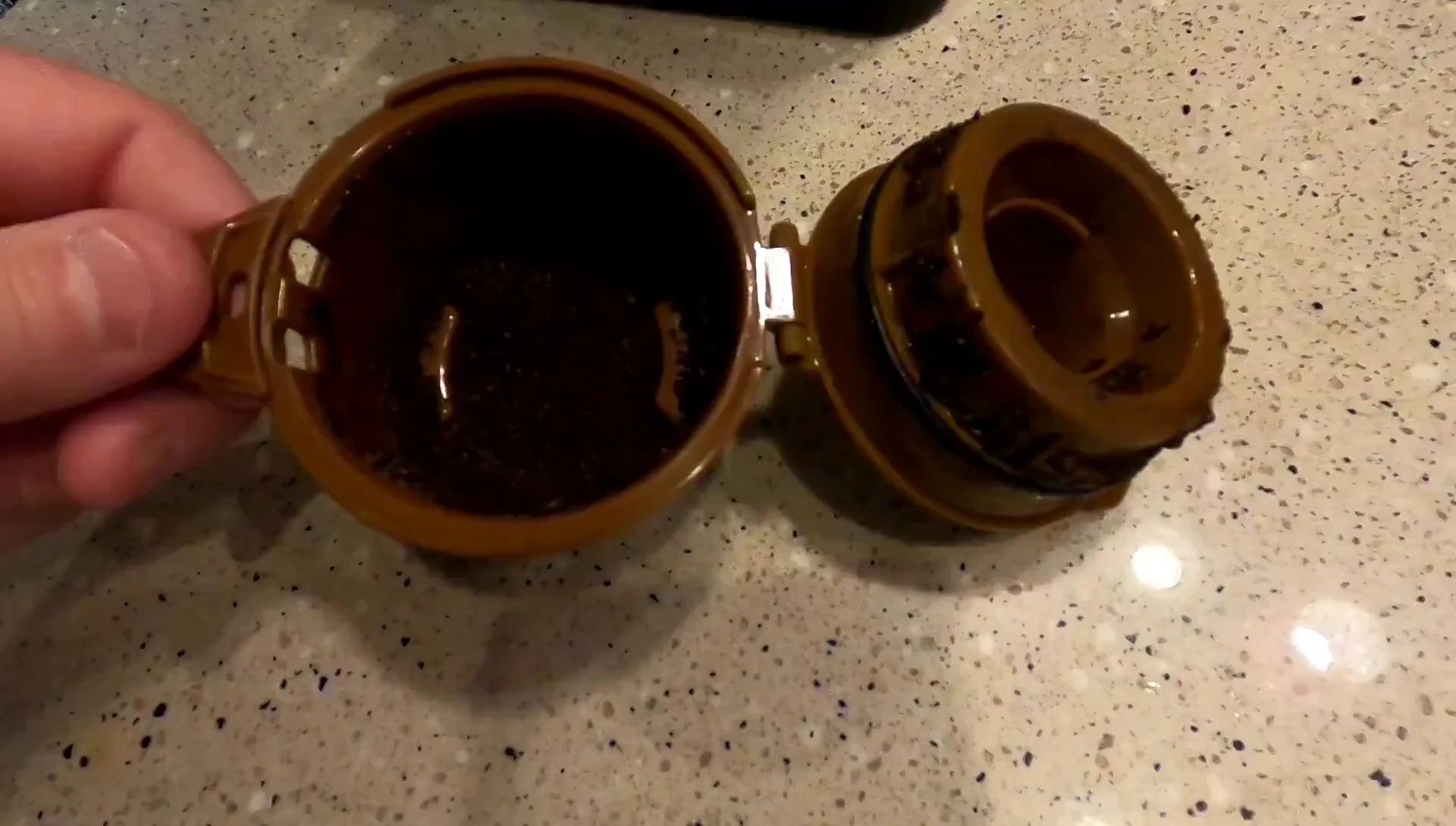 Cleaning the single-serve basket.