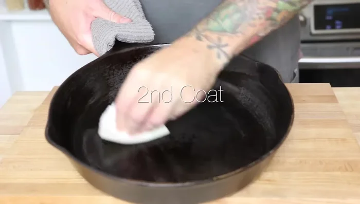 Bake for 20 minutes. Remove from oven, and while it's still hot (carefully!), apply another thin layer of canola oil. You should see it smoking.