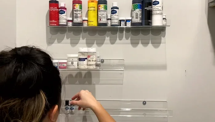 Utilize drawers for smaller items like flower cutters and piping tips. Ensure the drawers have grippy surfaces to prevent items from sliding around.